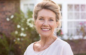 Smiling senior woman outdoors