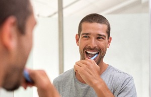 Man brushing his teeth