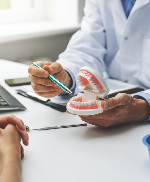 a man smiling on walking on a beach