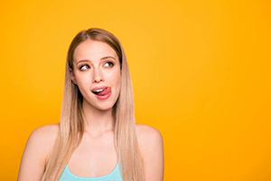Woman sticking tongue out
