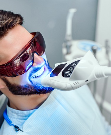 Man having his teeth whitened