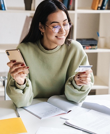 Woman holding a credit card