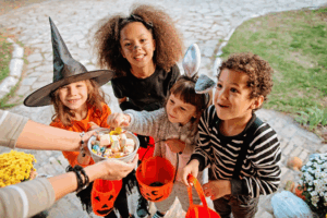 a group of children trick-or-treating