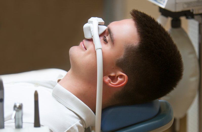 Patient smiling under nitrous oxide sedation dentistry
