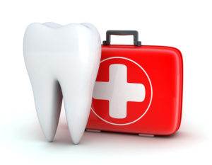 A dental emergency kit and a tooth on a white background.